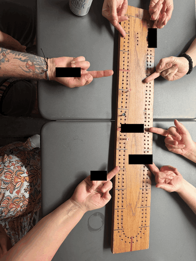 Long cribbage board censored poorly